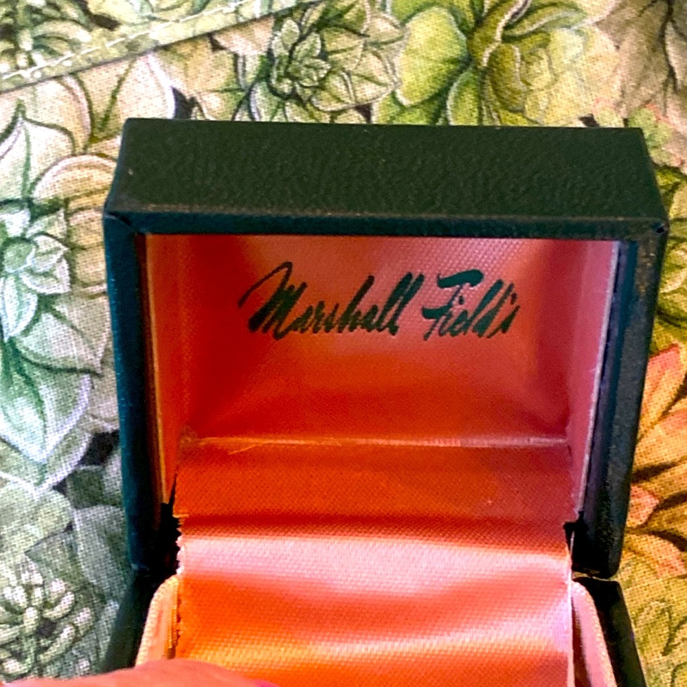 Marshall Fields now called Macy’s. Presentation earring, or ring box.